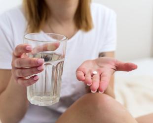 woman with pill