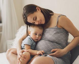 pregnant mum with baby
